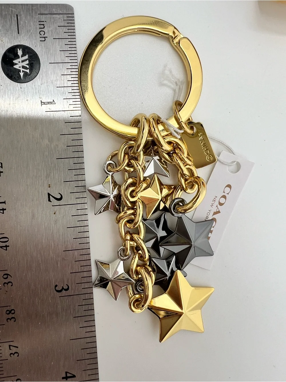 Coach Stars Gold Silver and Black Key Ring and Charm